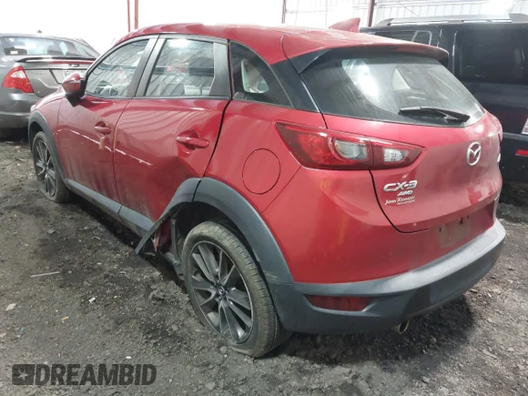 ✅ 2017 Mazda CX-3 Touring • VIN: JM1DKFC70H0149351 • Lot: 41320456. Wystawiony na IAAI z przebiegiem 103 138 mil. Bezpłatny archiwum sprzedaży aukcyjnych z USA i szczegółowy raport historii pojazdu na DreamBid. Zdjęcie 3.