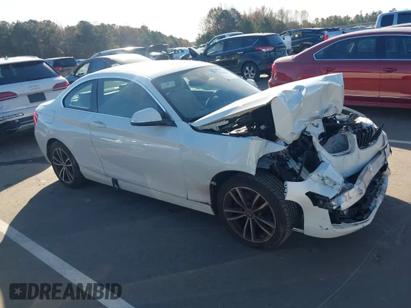 ✅ 2018 BMW 2 Series 230i • VIN: WBA2J1C59JVD09070 • Lot: 43701553. Listed on IAAI with 59,920 mi. Free auction sales archive from the USA and detailed vehicle history report at DreamBid. Image 1.