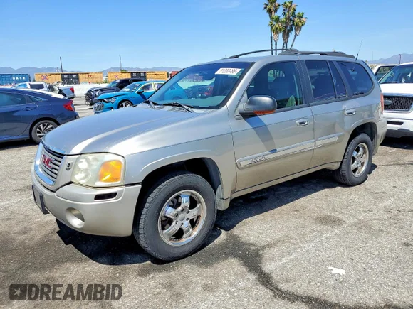 ✅ 2002 GMC Envoy SLE • VIN: 1GKDT13S322206310 • Лот: 51200486. Опубликован ранее на Copart с пробегом 245 234 миль. Бесплатный доступ к архиву аукционных продаж из США и подробный отчёт об истории автомобиля на DreamBid. Изображение 1.