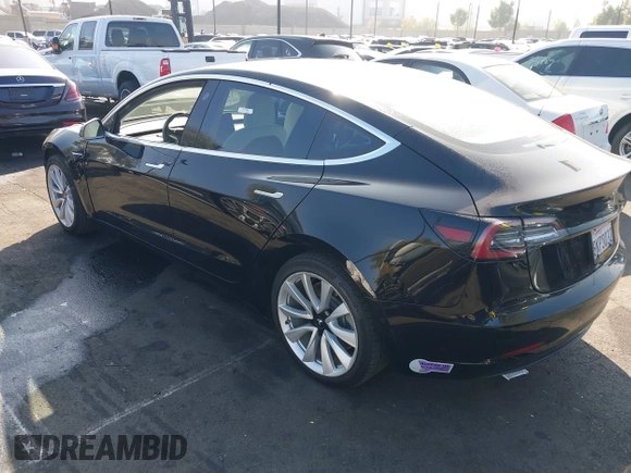 ✅ 2019 Tesla Model 3 Mid Range • VIN: 5YJ3E1EA0KF302432 • Lot: 43527822. Wystawiony na IAAI z przebiegiem 90 604 mil. Bezpłatny archiwum sprzedaży aukcyjnych z USA i szczegółowy raport historii pojazdu na DreamBid. Zdjęcie 3.