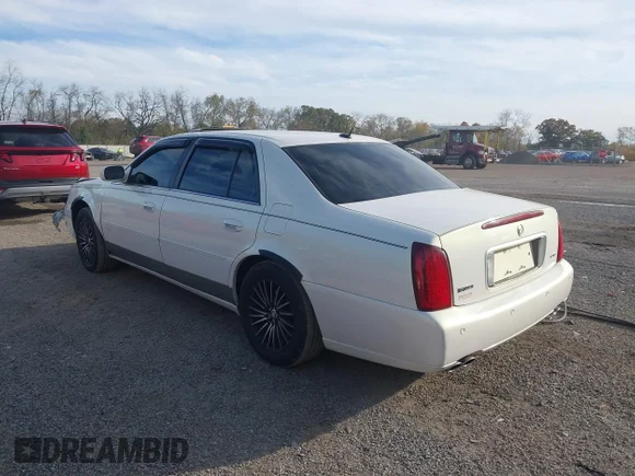 ✅ 2005 Cadillac DeVille • VIN: 1G6KF57935U129409 • Lot: 43555666. Wystawiony na IAAI z przebiegiem 105 515 mil. Bezpłatny archiwum sprzedaży aukcyjnych z USA i szczegółowy raport historii pojazdu na DreamBid. Zdjęcie 3.