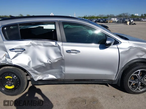 ✅ 2021 Kia Sportage SX Turbo • VIN: KNDPR3A60M7850846 • Lot: 44799409. Wystawiony na IAAI z przebiegiem 61 180 mil. Bezpłatny archiwum sprzedaży aukcyjnych z USA i szczegółowy raport historii pojazdu na DreamBid. Zdjęcie 6.