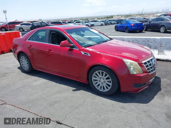 ✅ 2012 Cadillac CTS Luxury • VIN: 1G6DE5E51C0105612 • Лот: 42268764. Опубликован ранее на IAAI с пробегом 94 822 миль. Бесплатный доступ к архиву аукционных продаж из США и подробный отчёт об истории автомобиля на DreamBid. Изображение 1.