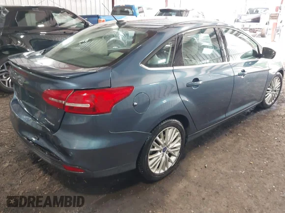 ✅ 2018 Ford Focus Titanium • VIN: 1FADP3J26JL294203 • Лот: 45018116. Опубліковано раніше на IAAI з пробігом 80 895 миль. Безкоштовний доступ до архіву аукціонних продажів зі США та докладний звіт про історію автомобіля на DreamBid. Зображення 4.