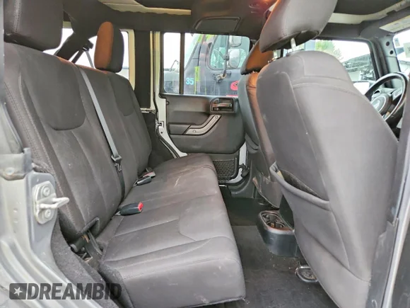 ✅ 2017 Jeep Wrangler Unlimited Sport • VIN: 1C4BJWDG3HL669843 • Lot: 48270056. Wystawiony na Copart z przebiegiem 105 725 mil. Bezpłatny archiwum sprzedaży aukcyjnych z USA i szczegółowy raport historii pojazdu na DreamBid. Zdjęcie 11.