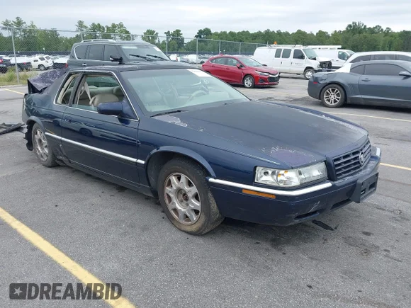 ✅ 1998 Cadillac Eldorado Touring • VIN: 1G6ET1294WU615346 • Lot: 42848206. Wystawiony na IAAI z przebiegiem 163 251 mil. Bezpłatny archiwum sprzedaży aukcyjnych z USA i szczegółowy raport historii pojazdu na DreamBid. Zdjęcie 1.