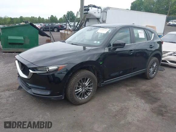 ✅ 2018 Mazda CX-5 Sport • VIN: JM3KFBBMXJ0455952 • Лот: 45205347. Опубликован ранее на IAAI с пробегом 62 297 миль. Бесплатный доступ к архиву аукционных продаж из США и подробный отчёт об истории автомобиля на DreamBid. Изображение 2.