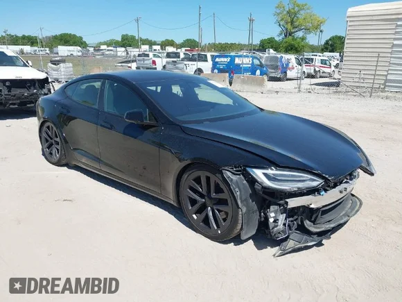 ✅ 2021 Tesla Model S Plaid • VIN: 5YJSA1E66MF452258 • Lot: 41832000. Listed on IAAI with 42,845 mi. Free auction sales archive from the USA and detailed vehicle history report at DreamBid. Image 1.