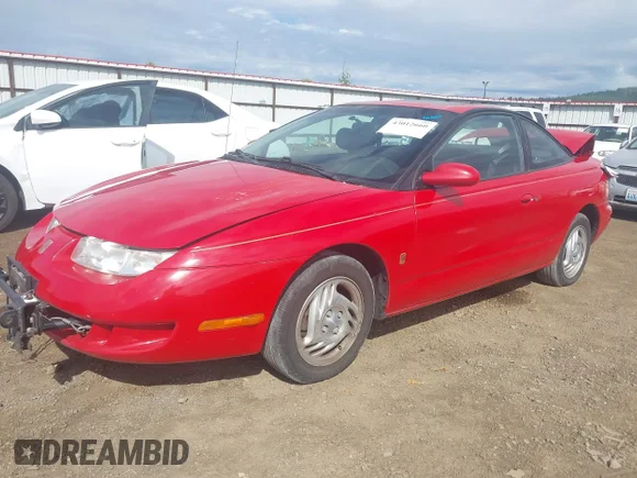 ✅ 1997 Saturn 2dr Coupe • VIN: 1G8ZH1272VZ206904 • Lot: 43012660. Wystawiony na IAAI z przebiegiem 159 456 mil. Bezpłatny archiwum sprzedaży aukcyjnych z USA i szczegółowy raport historii pojazdu na DreamBid. Zdjęcie 2.