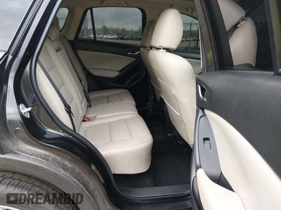 ✅ 2013 Mazda CX-5 Grand Touring • VIN: JM3KE2DE4D0150671 • Lot: 44525446. Wystawiony na IAAI z przebiegiem 219 587 mil. Bezpłatny archiwum sprzedaży aukcyjnych z USA i szczegółowy raport historii pojazdu na DreamBid. Zdjęcie 8.