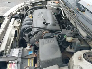 ✅ 2003 Toyota Corolla CE • VIN: JTDBR32E630033159 • Lot: 42258757. Listed on IAAI with 218,397 mi. Free auction sales archive from the USA and detailed vehicle history report at DreamBid. Image 12.