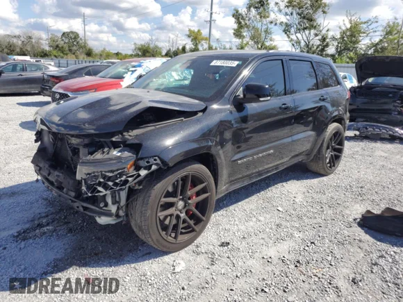 ✅ 2017 Jeep Grand Cherokee SRT • VIN: 1C4RJFDJ3HC719103 • Lot: 87180035. Wystawiony na Copart z przebiegiem 75 259 mil. Bezpłatny archiwum sprzedaży aukcyjnych z USA i szczegółowy raport historii pojazdu na DreamBid. Zdjęcie 1.