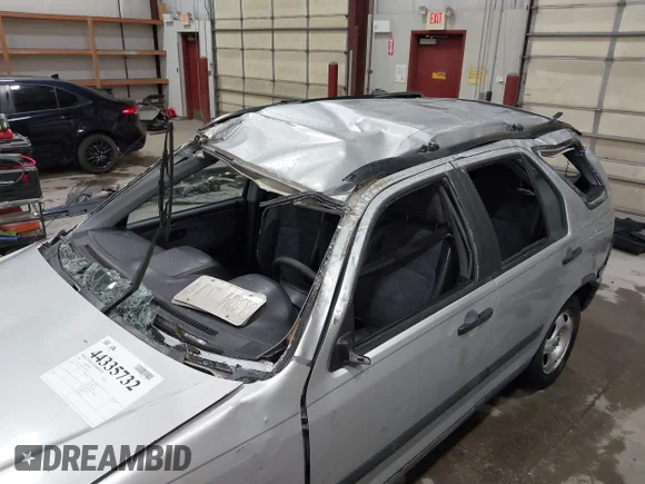 ✅ 2002 Honda CR-V LX • VIN: JHLRD784X2C050145 • Lot: 44335732. Wystawiony na IAAI z przebiegiem 265 540 mil. Bezpłatny archiwum sprzedaży aukcyjnych z USA i szczegółowy raport historii pojazdu na DreamBid. Zdjęcie 6.
