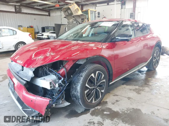 ✅ 2022 Kia EV6 Wind • VIN: KNDC3DLC8N5042850 • Лот: 42174759. Опубліковано раніше на IAAI з пробігом 29 897 миль. Безкоштовний доступ до архіву аукціонних продажів зі США та докладний звіт про історію автомобіля на DreamBid. Зображення 2.
