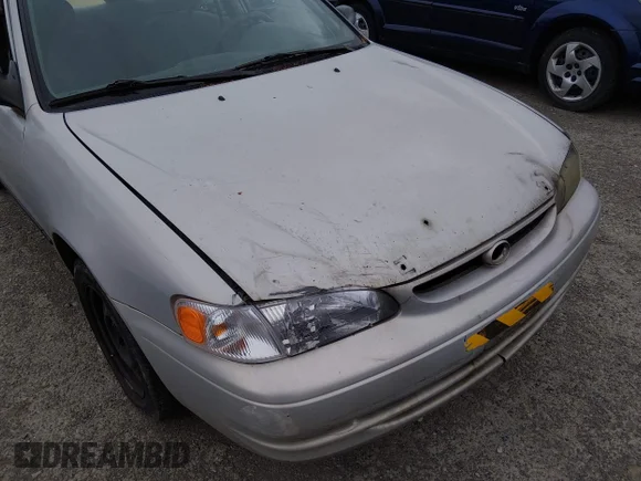 ✅ 1999 Toyota Corolla LE • VIN: 1NXBR12E8XZ158761 • Lot: 45302989. Wystawiony na IAAI z przebiegiem 224 337 mil. Bezpłatny archiwum sprzedaży aukcyjnych z USA i szczegółowy raport historii pojazdu na DreamBid. Zdjęcie 6.