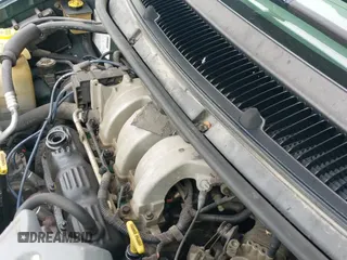 ✅ 1999 Chrysler Town & Country • VIN: 1C4GP54G6XB603564 • Lot: 41823340. Listed on IAAI with 104,321 mi. Free auction sales archive from the USA and detailed vehicle history report at DreamBid. Image 20.