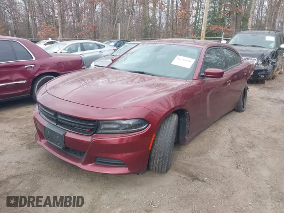 ✅ 2019 Dodge Charger SXT • VIN: 2C3CDXBG8KH695268 • Lot: 41241876. Listed on IAAI with 73,782 mi. Free auction sales archive from the USA and detailed vehicle history report at DreamBid. Image 2.