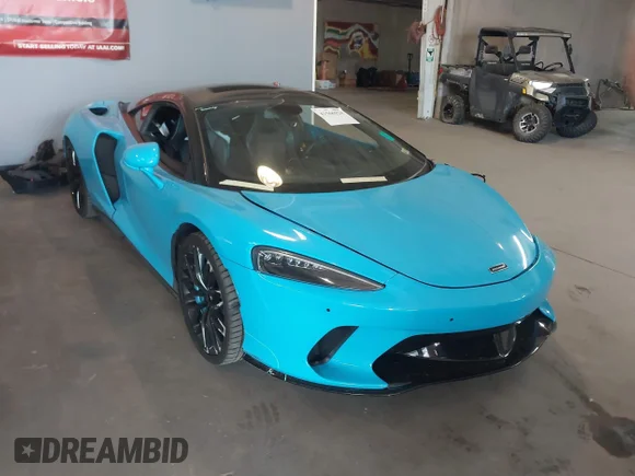 ✅ 2023 McLaren GT • VIN: SBM22GCA4PW002624 • Лот: 42566924. Опубліковано раніше на IAAI з пробігом 23 790 миль. Безкоштовний доступ до архіву аукціонних продажів зі США та докладний звіт про історію автомобіля на DreamBid. Зображення 1.