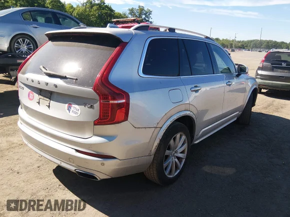 ✅ 2016 Volvo XC90 T6 Momentum • VIN: YV4A22PK8G1027983 • Lot: 45283127. Listed on IAAI with 109,735 mi. Free auction sales archive from the USA and detailed vehicle history report at DreamBid. Image 4.