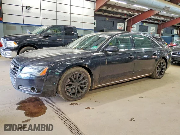 ✅ 2011 Audi A8 • VIN: WAURVAFD0BN024715 • Лот: 54393216. Опубликован ранее на Copart с пробегом 204 801 миль. Бесплатный доступ к архиву аукционных продаж из США и подробный отчёт об истории автомобиля на DreamBid. Изображение 1.