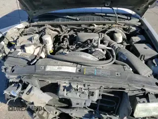 2002 Chevrolet Blazer LS z VIN 1GNDT13W32K118556, wystawiony jako Copart lot #80883814 z przebiegiem 200 632 mil mil oraz Szkoda całkowita • Salvage title. Historia ofert i sprzedaży dostępna na DreamBid. Obrazek 16.