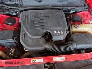 ✅ 2014 Dodge Challenger SXT • VIN: 2C3CDYAG9EH274333 • Lot: 75276404. Wystawiony na Copart z przebiegiem 184 176 mil. Bezpłatny archiwum sprzedaży aukcyjnych z USA i szczegółowy raport historii pojazdu na DreamBid. Zdjęcie 13.