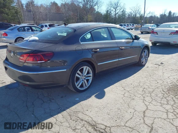 ✅ 2013 Volkswagen CC Lux • VIN: WVWRP7ANXDE522469 • Лот: 41413025. Опубликован ранее на IAAI с пробегом 115 117 миль. Бесплатный доступ к архиву аукционных продаж из США и подробный отчёт об истории автомобиля на DreamBid. Изображение 4.