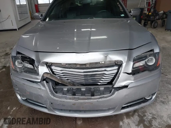 ✅ 2014 Chrysler 300 S • VIN: 2C3CCAGG7EH383911 • Lot: 44506485. Listed on IAAI with 140,700 mi. Free auction sales archive from the USA and detailed vehicle history report at DreamBid. Image 6.