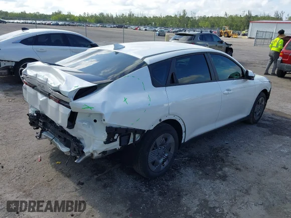 ✅ 2025 Kia K4 LXS • VIN: 3KPFT4DE1SE083270 • Lot: 42308423. Listed on IAAI with 7,462 mi. Free auction sales archive from the USA and detailed vehicle history report at DreamBid. Image 4.