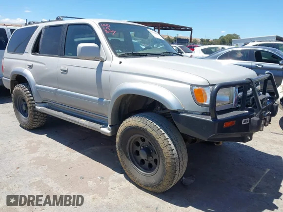 ✅ 1999 Toyota 4Runner Limited • VIN: JT3HN87R4X0256289 • Lot: 45160118. Listed on IAAI with 199,300 mi. Free auction sales archive from the USA and detailed vehicle history report at DreamBid. Image 1.