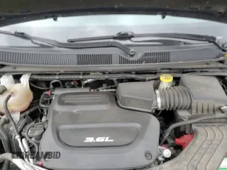 ✅ 2018 Chrysler Pacifica Touring L Plus • VIN: 2C4RC1EGXJR321755 • Лот: 90420735. Опубликован ранее на Copart с пробегом 77 051 миль. Бесплатный доступ к архиву аукционных продаж из США и подробный отчёт об истории автомобиля на DreamBid. Изображение 16.