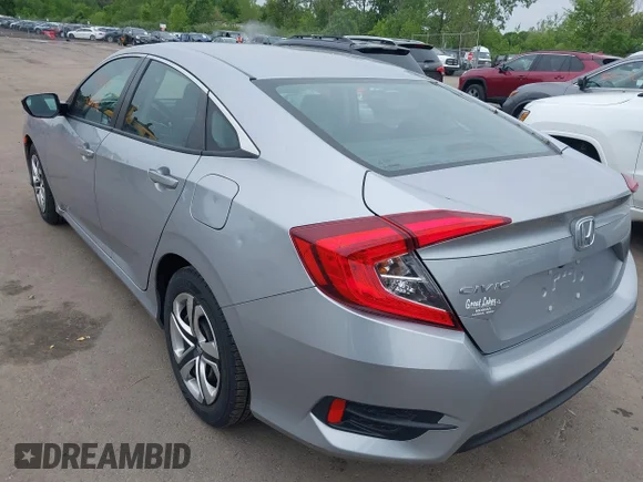✅ 2018 Honda Civic LX • VIN: 2HGFC2F55JH592803 • Lot: 45148712. Listed on IAAI with 67,919 mi. Free auction sales archive from the USA and detailed vehicle history report at DreamBid. Image 3.