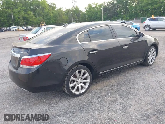 ✅ 2013 Buick LaCrosse Touring • VIN: 1G4GJ5E32DF215583 • Лот: 42125132. Опубликован ранее на IAAI с пробегом 118 602 миль. Бесплатный доступ к архиву аукционных продаж из США и подробный отчёт об истории автомобиля на DreamBid. Изображение 4.
