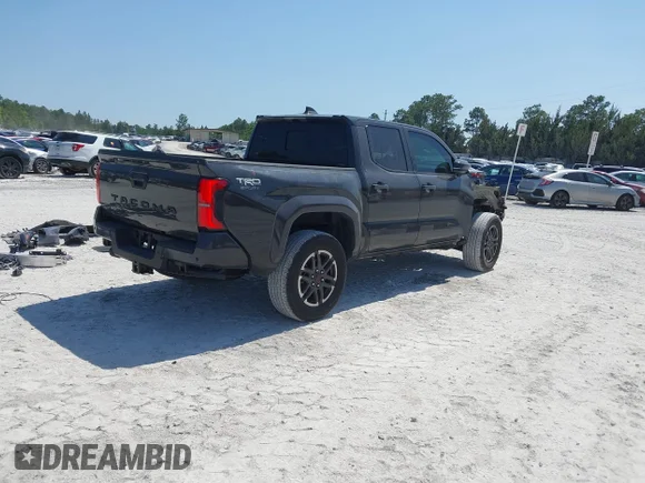✅ 2025 Toyota Tacoma SR5 • VIN: 3TMKB5FN7SM030051 • Lot: 44948691. Listed on IAAI with 27,146 mi. Free auction sales archive from the USA and detailed vehicle history report at DreamBid. Image 4.