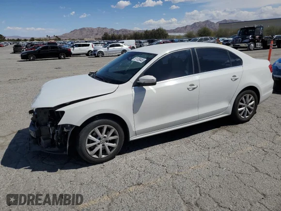 ✅ 2014 Volkswagen Jetta SE • VIN: 3VWD17AJ7EM375853 • Lot: 51120445. Wystawiony na Copart z przebiegiem 159 356 mil. Bezpłatny archiwum sprzedaży aukcyjnych z USA i szczegółowy raport historii pojazdu na DreamBid. Zdjęcie 1.