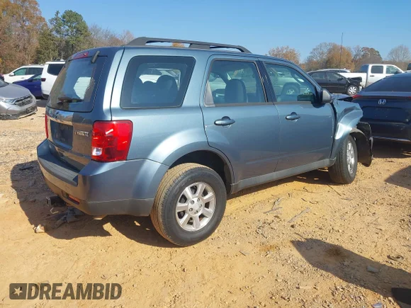 ✅ 2011 Mazda Tribute Sport • VIN: 4F2CY0C79BKM03304 • Лот: 43745618. Опубліковано раніше на IAAI з пробігом 166 371 миль. Безкоштовний доступ до архіву аукціонних продажів зі США та докладний звіт про історію автомобіля на DreamBid. Зображення 4.
