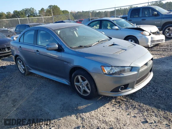 ✅ 2015 Mitsubishi Lancer Ralliart • VIN: JA32V6FV2FU007841 • Lot: 43985268. Listed on IAAI with 100,948 mi. Free auction sales archive from the USA and detailed vehicle history report at DreamBid. Image 1.