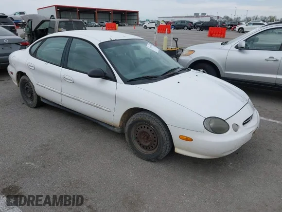 ✅ 1999 Ford Taurus LX • VIN: 1FAFP52U3XA234663 • Lot: 41997339. Wystawiony na IAAI z przebiegiem 243 150 mil. Bezpłatny archiwum sprzedaży aukcyjnych z USA i szczegółowy raport historii pojazdu na DreamBid. Zdjęcie 1.