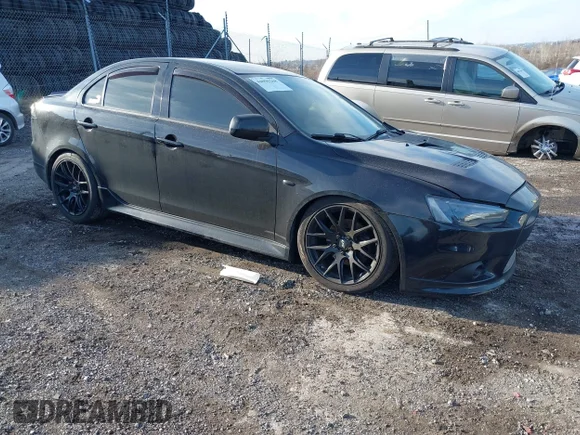 ✅ 2014 Mitsubishi Lancer Ralliart • VIN: JA32V6FVXEU014440 • Lot: 44096268. Listed on IAAI with 129,011 mi. Free auction sales archive from the USA and detailed vehicle history report at DreamBid. Image 1.
