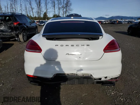 ✅ 2016 Porsche Panamera 4 • VIN: WP0AA2A79GL005814 • Лот: 37342643. Опубліковано раніше на Copart з пробігом 86 848 миль. Безкоштовний доступ до архіву аукціонних продажів зі США та докладний звіт про історію автомобіля на DreamBid. Зображення 6.