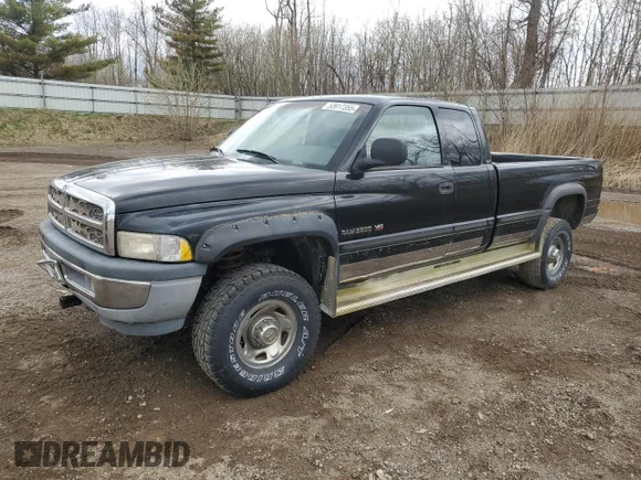 ✅ 1999 Dodge 2500 • VIN: 1B7KF23W1XJ622730 • Lot: 53917355. Listed on Copart with 202,303 mi. Free auction sales archive from the USA and detailed vehicle history report at DreamBid. Image 1.
