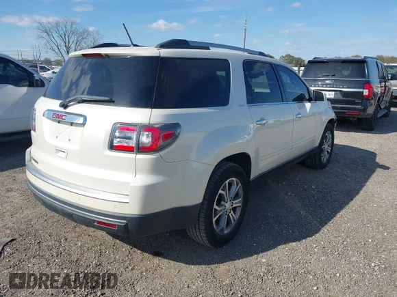 ✅ 2015 GMC Acadia SLT • VIN: 1GKKRSKD2FJ291652 • Lot: 44285278. Listed on IAAI with 123,009 mi. Free auction sales archive from the USA and detailed vehicle history report at DreamBid. Image 4.