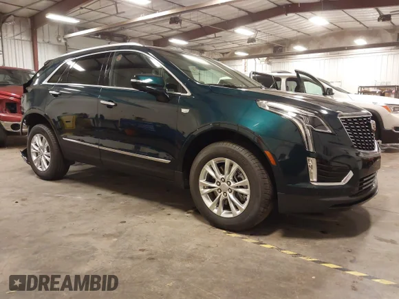 ✅ 2025 Cadillac XT5 AWD Luxury • VIN: 1GYKNBR43SZ130925 • Лот: 42972543. Опубликован ранее на IAAI с пробегом 2 589 миль. Бесплатный доступ к архиву аукционных продаж из США и подробный отчёт об истории автомобиля на DreamBid. Изображение 1.