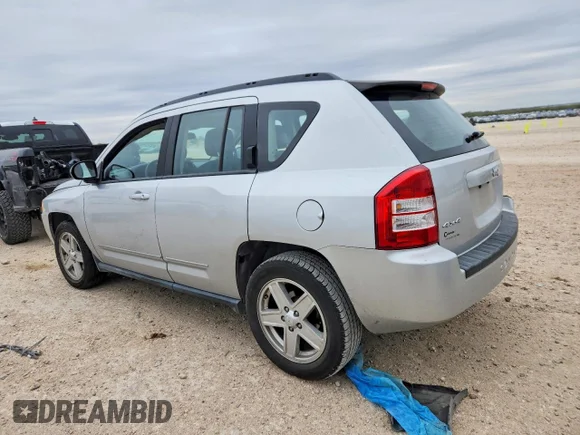 ✅ 2010 Jeep Compass Sport • VIN: 1J4NF4FB3AD649476 • Lot: 98414595. Wystawiony na Copart z przebiegiem 83 161 mil. Bezpłatny archiwum sprzedaży aukcyjnych z USA i szczegółowy raport historii pojazdu na DreamBid. Zdjęcie 2.