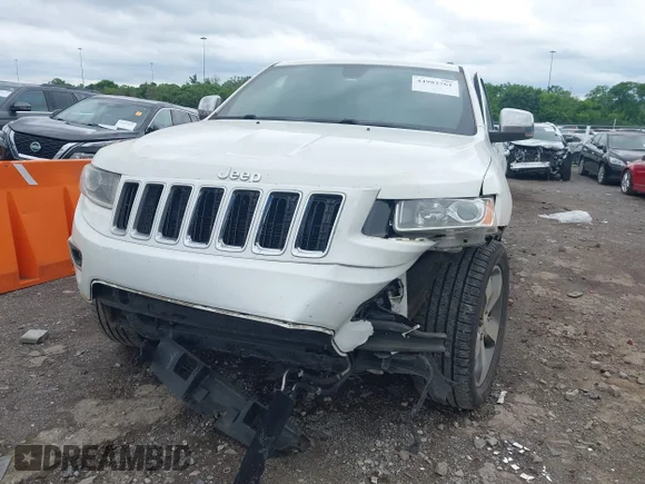✅ 2015 Jeep Grand Cherokee Limited • VIN: 1C4RJFBG2FC103820 • Лот: 44982761. Опубликован ранее на IAAI с пробегом 306 720 миль. Бесплатный доступ к архиву аукционных продаж из США и подробный отчёт об истории автомобиля на DreamBid. Изображение 6.