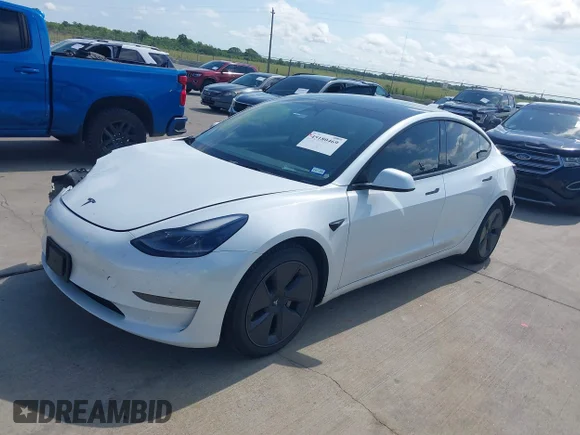 ✅ 2023 Tesla Model 3 • VIN: 5YJ3E1EAXPF385729 • Лот: 45180469. Опубликован ранее на IAAI с пробегом 60 822 миль. Бесплатный доступ к архиву аукционных продаж из США и подробный отчёт об истории автомобиля на DreamBid. Изображение 2.