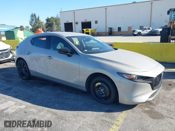 ✅ 2026 Mazda 3 S Select Sport • VIN: JM1BPAKL1T1854690 • Lot: 44450564. Listed on IAAI with 8,867 mi. Free auction sales archive from the USA and detailed vehicle history report at DreamBid. Image 1.