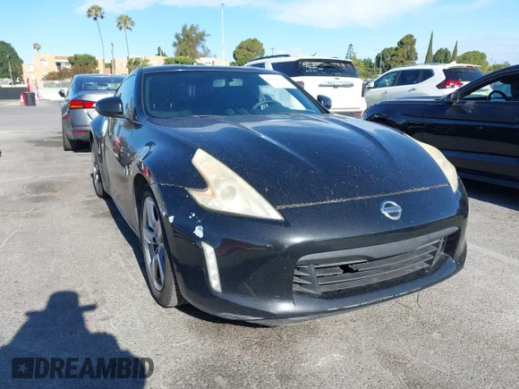✅ 2009 Nissan 370Z Touring • VIN: JN1AZ44E39M404023 • Lot: 45039261. Wystawiony na IAAI z przebiegiem 154 548 mil. Bezpłatny archiwum sprzedaży aukcyjnych z USA i szczegółowy raport historii pojazdu na DreamBid. Zdjęcie 1.