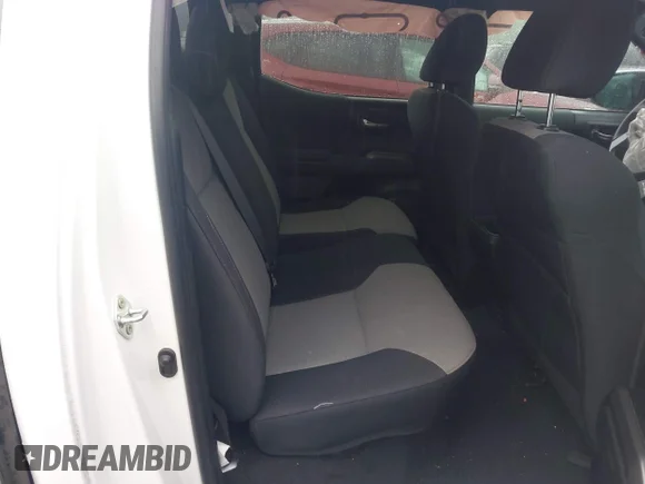 ✅ 2023 Toyota Tacoma SR5 • VIN: 3TMAZ5CN7PM212951 • Лот: 45389933. Опубликован ранее на IAAI с пробегом 86 456 миль. Бесплатный доступ к архиву аукционных продаж из США и подробный отчёт об истории автомобиля на DreamBid. Изображение 8.