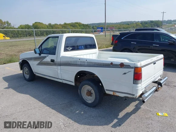 ✅ 1990 Isuzu Pickup S • VIN: 4S1CL11L4L4200565 • Lot: 43196494. Wystawiony na IAAI z przebiegiem 166 944 mil. Bezpłatny archiwum sprzedaży aukcyjnych z USA i szczegółowy raport historii pojazdu na DreamBid. Zdjęcie 3.